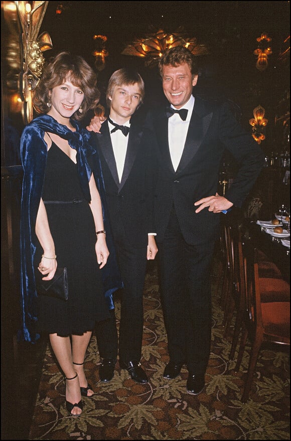 Nathalie Baye, David Hallyday et Johnny à Paris, en 1983.