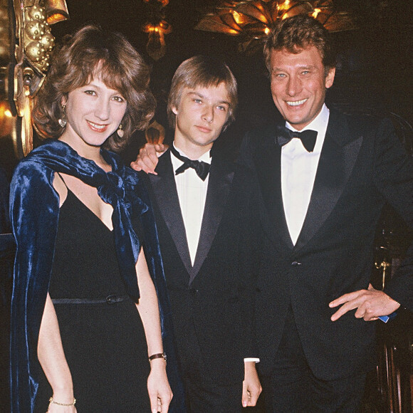 Nathalie Baye, David Hallyday et Johnny à Paris, en 1983.