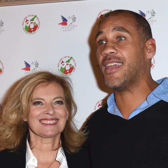 Valérie Trierweiler et son compagnon Romain Magellan - Le Secours Populaire fête Noêl pour 300 enfants au Musée des Arts Forains à Paris, le 5 décembre 2018. © Giancarlo Gorassini/Bestimage