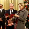 Le prince Albert II de Monaco et la princesse Charlene lors de la remise de colis de Noël dans les locaux de la Croix-Rouge monégasque le 13 décembre 2018. © Jean-François Ottonello / Nice-Matin / Bestimage