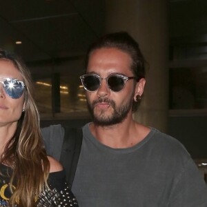 Heidi Klum et son compagnon Tom Kaulitz arrivent à l'aéroport de LAX à Los Angeles, le 12 avril 2018.