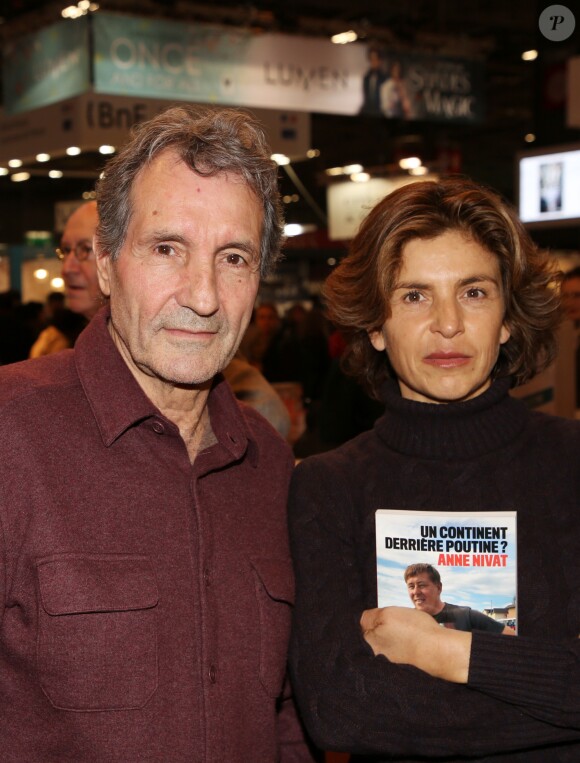 Jean-Jacques Bourdin et sa femme Anne Nivat lors du salon du livre de Paris le 17 Mars 2018 à la Porte de Versailles de Paris. © Denis Guignebourg/Bestimage