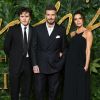 David Beckham et Victoria Beckham avec leur fils aîné Brooklyn à la soirée Fashion Awards 2018 au Royal Albert Hall à Londres, le 10 décembre 2018.