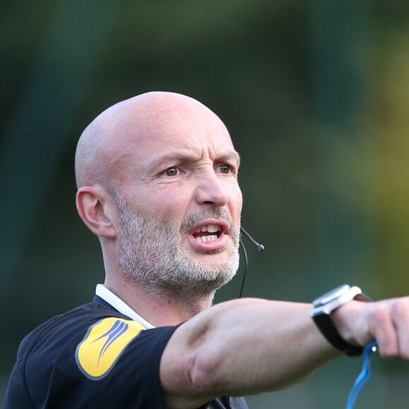 Frank Leboeuf - Dans le cadre des 13èmes Journées de l'Arbitrage, Christophe Maé, Frank Leboeuf et Thierry Braillard, Secrétaire d'Etat aux Sports auprès du ministre de la ville, de la jeunesse et des Sports, se sont retrouvés sur le Stade Emile Antoine pour arbitrer des matchs de football entre jeunes, à Paris, le 30 octobre 2014.30/10/2014 - Paris