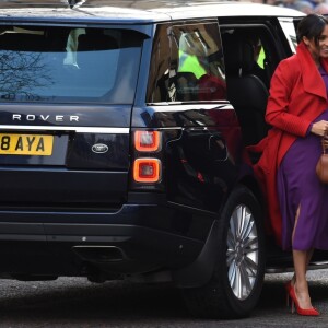 Le prince Harry, duc de Sussex, et Meghan Markle (enceinte), duchesse de Sussex, arrivent à Birkenhead, le 14 janvier 2019.