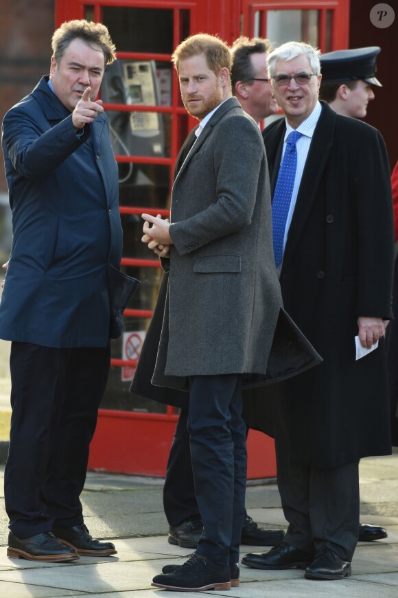 Le prince Harry, duc de Sussex, et Meghan Markle (enceinte), duchesse de Sussex, arrivent à Birkenhead, le 14 janvier 2019.