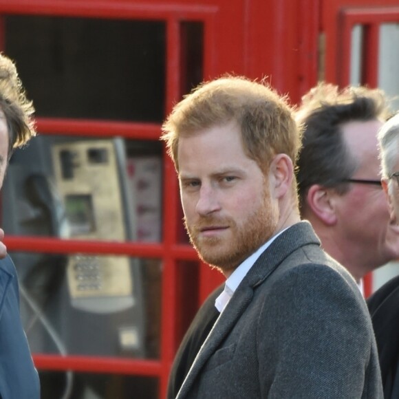 Le prince Harry, duc de Sussex, et Meghan Markle (enceinte), duchesse de Sussex, arrivent à Birkenhead, le 14 janvier 2019.