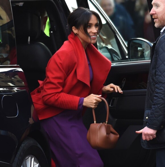 Le prince Harry, duc de Sussex, et Meghan Markle (enceinte), duchesse de Sussex, arrivent à Birkenhead, le 14 janvier 2019.