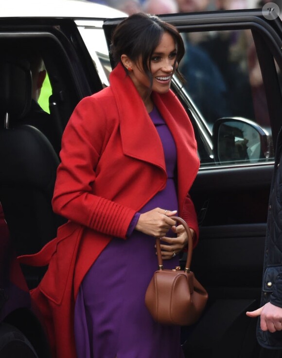 Le prince Harry, duc de Sussex, et Meghan Markle (enceinte), duchesse de Sussex, arrivent à Birkenhead, le 14 janvier 2019.