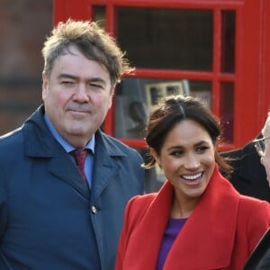 Le prince Harry, duc de Sussex, et Meghan Markle (enceinte), duchesse de Sussex, arrivent à Birkenhead, le 14 janvier 2019.