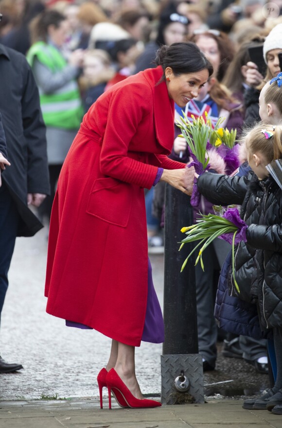 Le prince Harry, duc de Sussex, et Meghan Markle, duchesse de Sussex en visite dans la ville de Birkenhead, ici au square Hamilton, le 14 janvier 2019.
