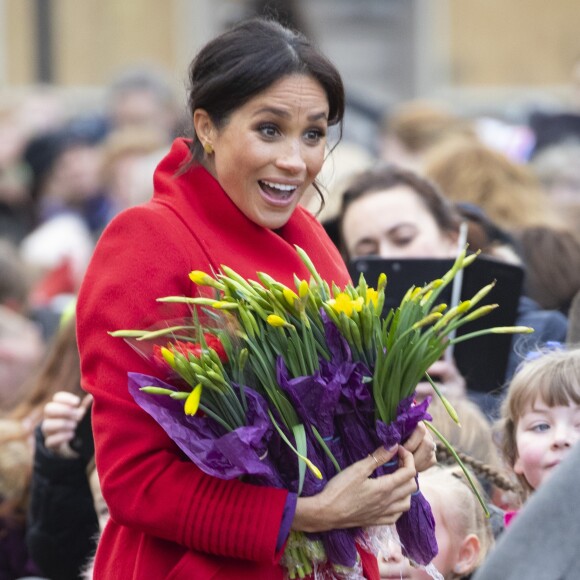 Le prince Harry, duc de Sussex, et Meghan Markle, duchesse de Sussex en visite dans la ville de Birkenhead, ici au square Hamilton, le 14 janvier 2019.