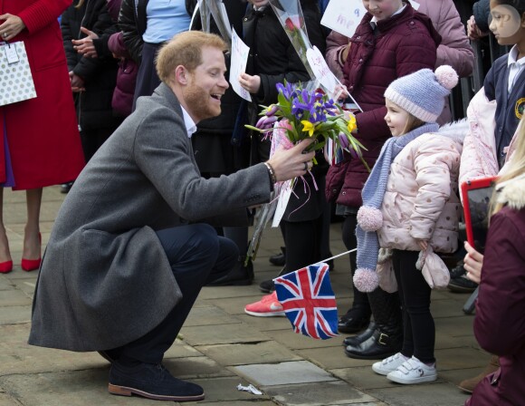 Le prince Harry, duc de Sussex, et Meghan Markle, duchesse de Sussex en visite dans la ville de Birkenhead, ici au square Hamilton le 14 janvier 2019.