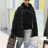 Exclusif - Rihanna porte un sac Christian Dior à son arrivée à l'aéroport de JFK à New York, le 13 janvier 2019