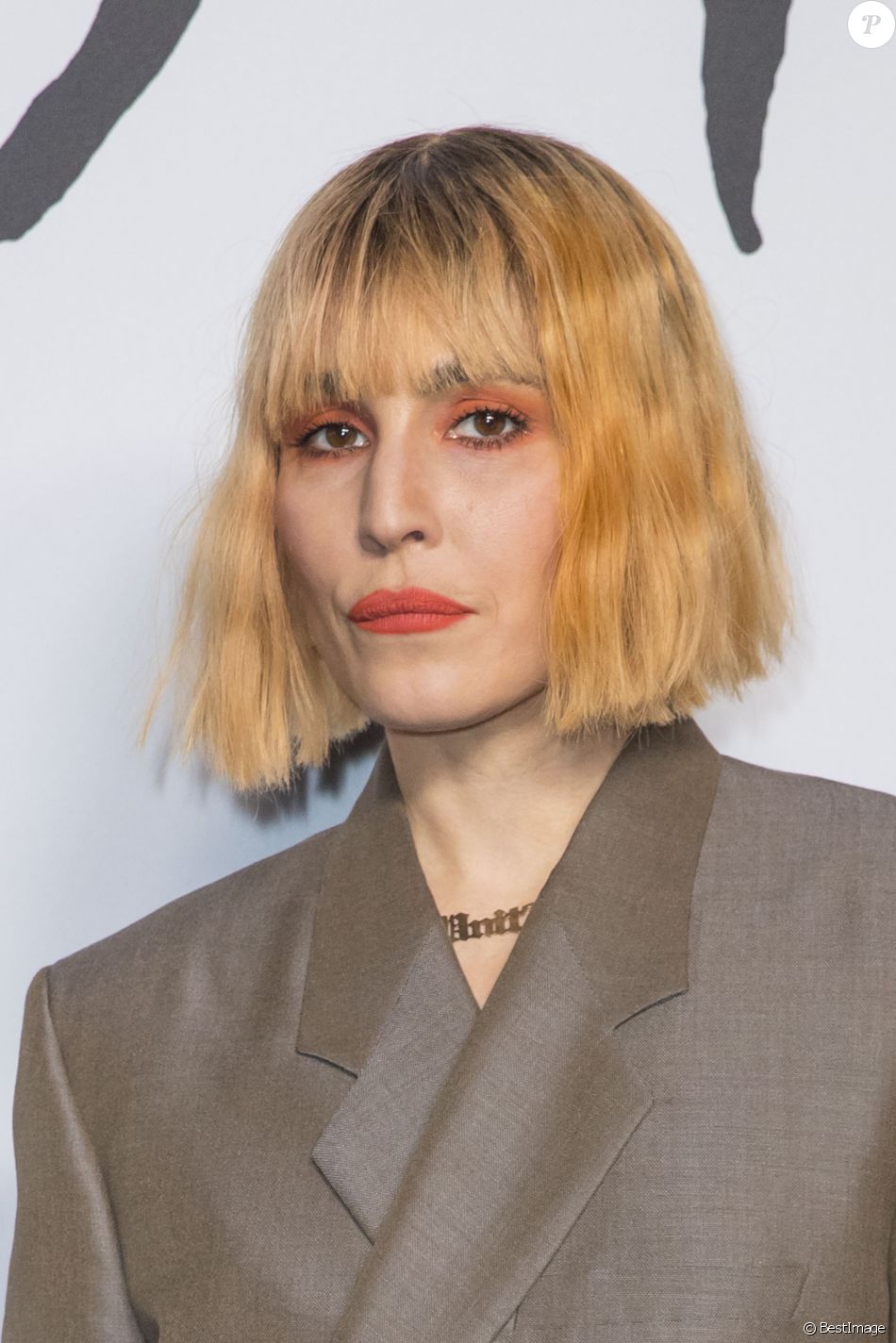 Noomi Rapace lors du photocall du défilé Christian Dior Homme automne