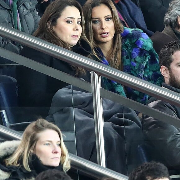 Claudia Tagbo, son compagnon et Malika Ménard (Miss France 2010) dans les tribunes du Parc des Princes lors du match de football de ligue 1 opposant le Paris Saint-Germain (PSG) au Stade rennais FC à Paris, le 27 janvier 2019. Le PSG a gagné 4-1.