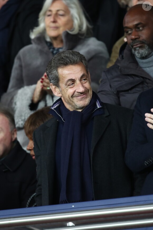 Nicolas Sarkozy dans les tribunes du Parc des Princes lors du match de football de ligue 1 opposant le Paris Saint-Germain (PSG) au Stade rennais FC à Paris, le 27 janvier 2019. Le PSG a gagné 4-1.