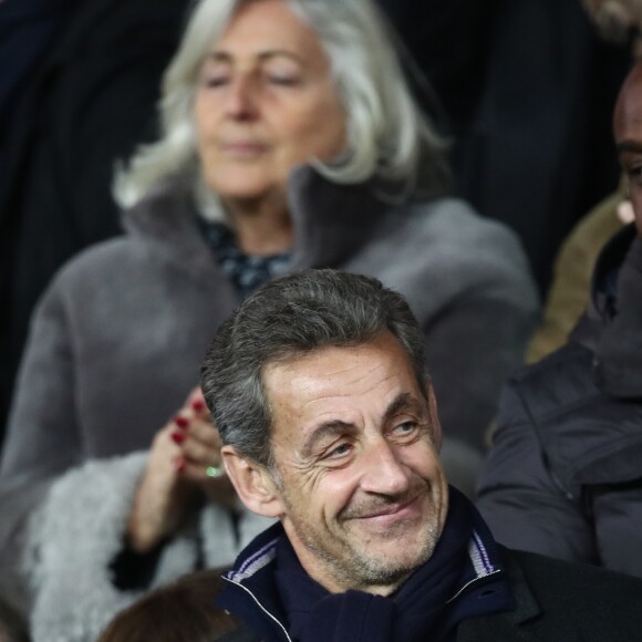 Nicolas Sarkozy dans les tribunes du Parc des Princes lors du match de football de ligue 1 opposant le Paris Saint-Germain (PSG) au Stade rennais FC à Paris, le 27 janvier 2019. Le PSG a gagné 4-1.