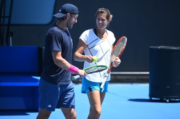 Lucas Pouille à l'entraînement avec sa coach Amélie Mauresmo lors de l'Open d'Australie le 24 janvier 2019.