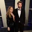 Miley Cyrus et son mari Liam Hemsworth à la soirée Vanity Fair Oscar Party à Los Angeles, le 24 février 2019