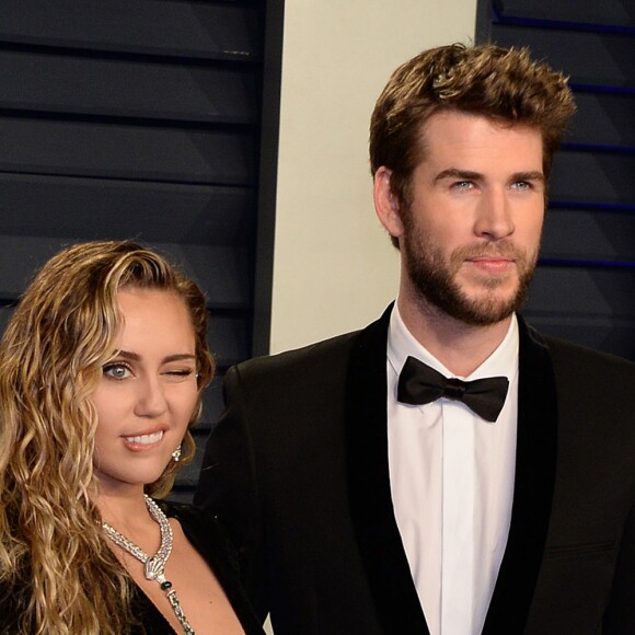Miley Cyrus et son mari Liam Hemsworth à la soirée Vanity Fair Oscar Party à Los Angeles, le 24 février 2019