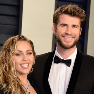 Miley Cyrus et son mari Liam Hemsworth à la soirée Vanity Fair Oscar Party à Los Angeles, le 24 février 2019