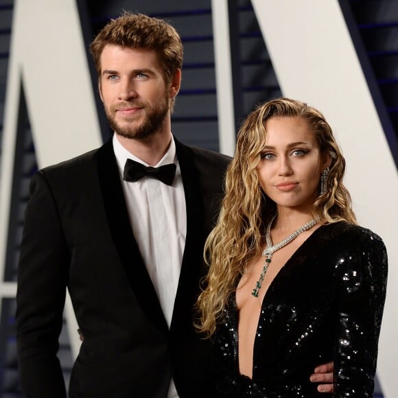 Miley Cyrus et son mari Liam Hemsworth à la soirée Vanity Fair Oscar Party à Los Angeles, le 24 février 2019