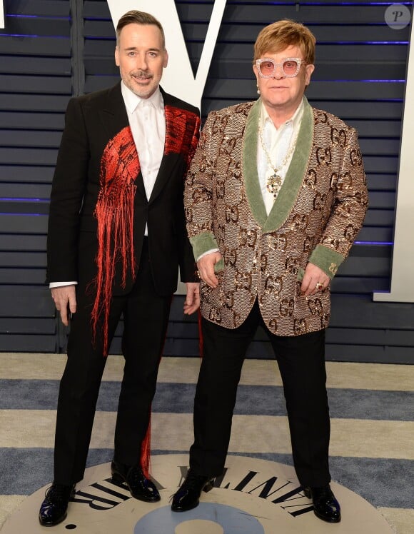 Elton John et son mari David Furnish à la soirée Vanity Fair Oscar Party à Los Angeles, le 24 février 2019