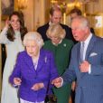 Le prince Charles, sa mère Elizabeth II, Kate Middleton, le prince William, le prince Harry et Meghan Markle - La famille royale britannique réunie pour fêter le 50ème anniversaire de l'investiture du prince Charles au palais de Buckingham, le 5 mars 2019.