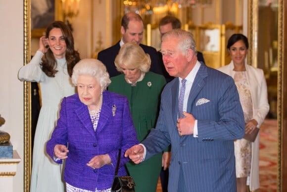 Le prince Charles, sa mère Elizabeth II, Kate Middleton, le prince William, le prince Harry et Meghan Markle - La famille royale britannique réunie pour fêter le 50ème anniversaire de l'investiture du prince Charles au palais de Buckingham, le 5 mars 2019.