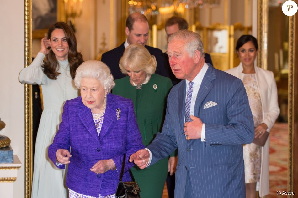 Le prince Charles, sa mère Elizabeth II, Kate Middleton, le prince William, le prince Harry et Meghan Markle - La famille royale britannique réunie pour fêter le 50ème anniversaire de l&#039;investiture du prince Charles au palais de Buckingham, le 5 mars 2019.