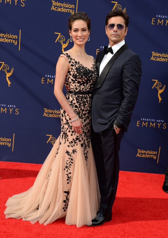 John Stamos et sa femme Caitlin McHugh lors de la soirée des Creative Arts Emmys Awards 2018 au Microsoft Theater à Los Angeles le 8 septembre 2018.