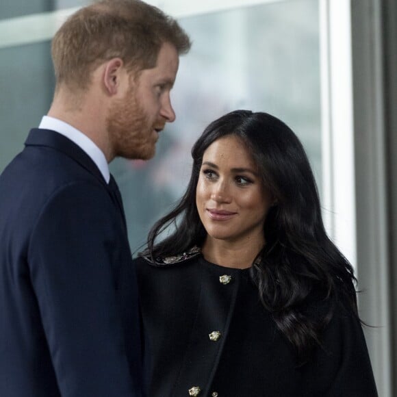 Le prince Harry, duc de Sussex, Meghan Markle, duchesse de Sussex lors de la signature du livre des condoléances à New Zealand House à Londres en hommage aux victimes de la tuerie de Christchurch. Londres, le 19 mars 2019.