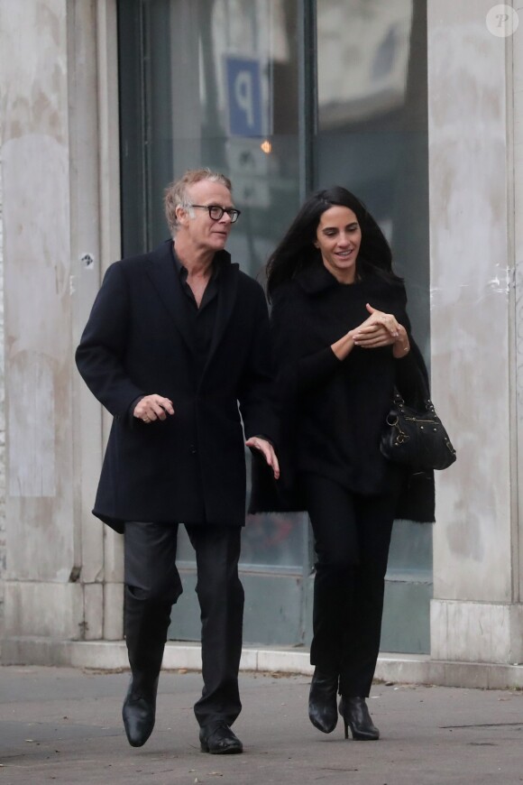 Exclusif - Franck Dubosc et sa femme Danièle sortent des obsèques du fondateur de Darty à Paris. Le 21 décembre 2018.