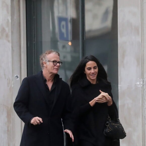 Exclusif - Franck Dubosc et sa femme Danièle sortent des obsèques du fondateur de Darty à Paris. Le 21 décembre 2018.