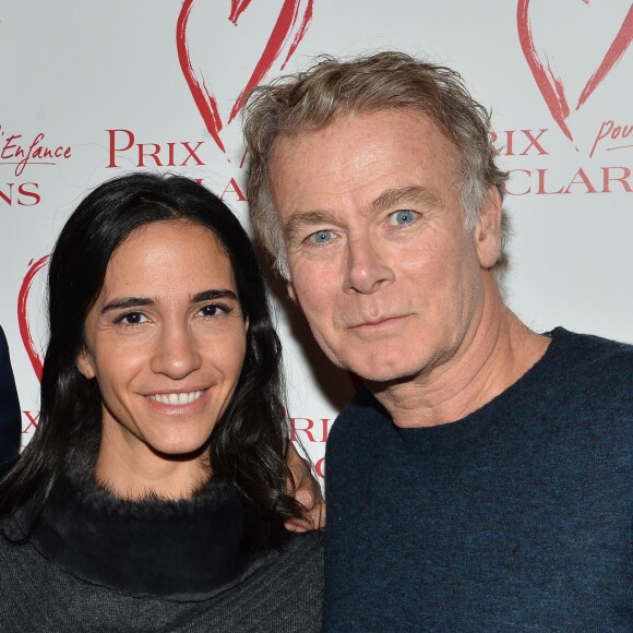 Franck Dubosc et sa femme Danièle - Goûter du Coeur du prix Clarins pour l'enfance organisé par Clarins, à l'hôtel Plaza Athénée à Paris, France, le 14 février 2018. Clarins poursuit son engagement de solidarité auprès des enfants et lance un nouveau produit "partage" en édition limitée. C'est autour du président du Conseil de Surveillance du Groupe Clarins, que de nombreuses personnalités sont venues découvrir ce nouveau produit "partage" signe de générosité. Tous ont partagé un merveilleux goûter sur le thème du coeur et s'adonner aux joies du patinage sur la splendide patinoire de 100 m2 située dans la cour intérieure du célèbre palace parisien! © Veeren/Bestimage