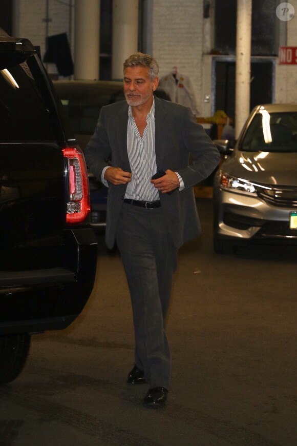 George Clooney et sa femme Amal Clooney arrivent à leur domicile après une longue journée de rendez-vous d'affaires à New York, le 25 avril 2019.