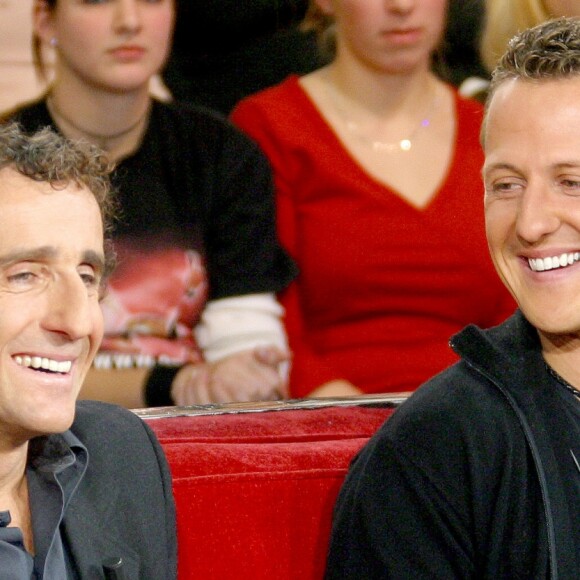 Alain Prost et Michael Schumacher sur le plateau de "Vivement dimanche" en 2004.