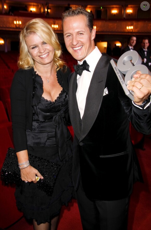 Michael Schumacher et sa femme Corinna lors de la soiree GQ a Berlin en Allemagne le 29 octobre 2010