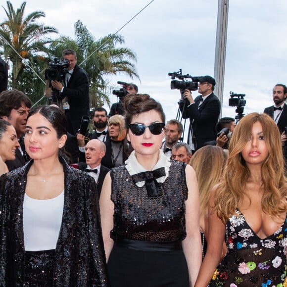Guest et Zahia Dehar - Montée des marches du film "A Hidden Life" lors du 72ème Festival International du Film de Cannes. Le 19 mai 2019 © Borde / Bestimage