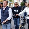 La première dame Brigitte Macron sort de chez elle à vélo, Le Touquet, France, le 25 mai 2019 la veille des élections européennes. © Stephane Lemouton / Bestimage