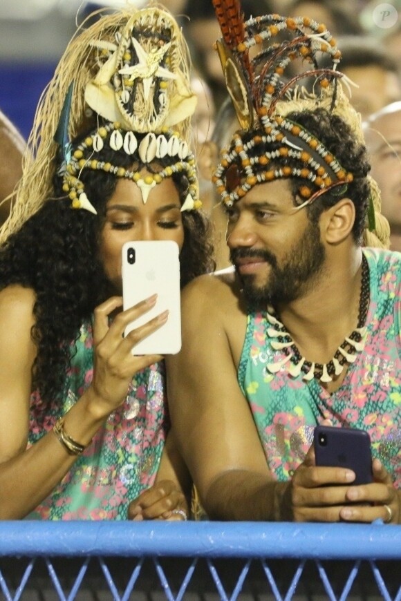 Russel Wilson et sa femme Ciara s'amusent au carnaval de Rio de Janeiro au Brésil, le 3 mars 2019.