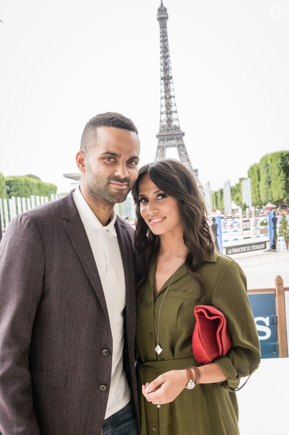 ony Parker et sa femme Axelle Francine - People lors du Longines Paris Eiffel Jumping au Champ-de-Mars à Paris, le 5 juillet 2015.