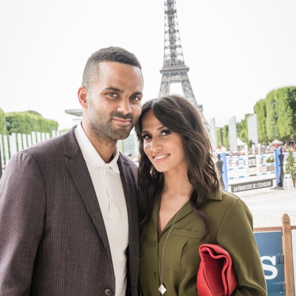 ony Parker et sa femme Axelle Francine - People lors du Longines Paris Eiffel Jumping au Champ-de-Mars à Paris, le 5 juillet 2015.