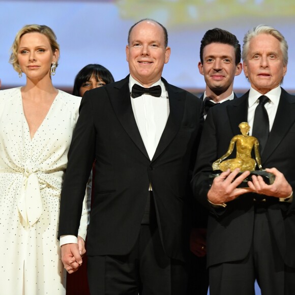 La princesse Charlene (robe Louis Vuitton) et le prince Albert II de Monaco et Michael Douglas lors de la cérémonie de remise des Nymphes d'or du 59e Festival de Télévision de Monte-Carlo au Grimaldi Forum à Monaco le 18 juin 2019. © Bruno Bebert/Bestimage