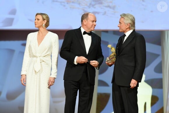 La princesse Charlene (robe Louis Vuitton) et le prince Albert II de Monaco et Michael Douglas lors de la cérémonie de remise des Nymphes d'or du 59e Festival de Télévision de Monte-Carlo au Grimaldi Forum à Monaco le 18 juin 2019. © Bruno Bebert/Bestimage