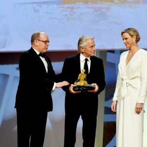 La princesse Charlene (robe Louis Vuitton) et le prince Albert II de Monaco et Michael Douglas lors de la cérémonie de remise des Nymphes d'or du 59e Festival de Télévision de Monte-Carlo au Grimaldi Forum à Monaco le 18 juin 2019. © Bruno Bebert/Bestimage