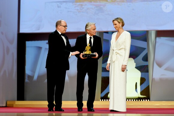 La princesse Charlene (robe Louis Vuitton) et le prince Albert II de Monaco et Michael Douglas lors de la cérémonie de remise des Nymphes d'or du 59e Festival de Télévision de Monte-Carlo au Grimaldi Forum à Monaco le 18 juin 2019. © Bruno Bebert/Bestimage