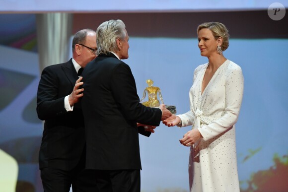 La princesse Charlene (robe Louis Vuitton) et le prince Albert II de Monaco et Michael Douglas lors de la cérémonie de remise des Nymphes d'or du 59e Festival de Télévision de Monte-Carlo au Grimaldi Forum à Monaco le 18 juin 2019. © Bruno Bebert/Bestimage