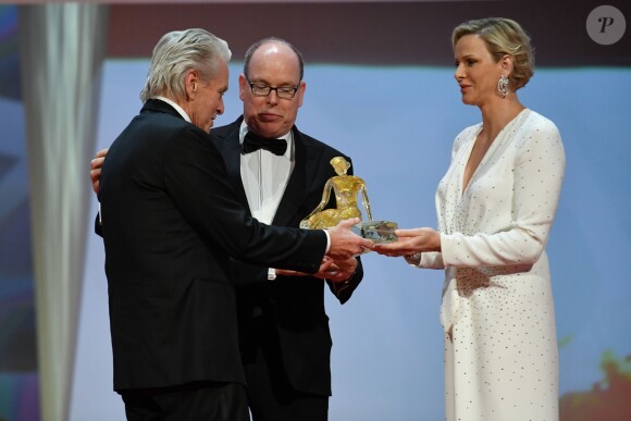 La princesse Charlene (robe Louis Vuitton) et le prince Albert II de Monaco et Michael Douglas lors de la cérémonie de remise des Nymphes d'or du 59e Festival de Télévision de Monte-Carlo au Grimaldi Forum à Monaco le 18 juin 2019. © Bruno Bebert/Bestimage